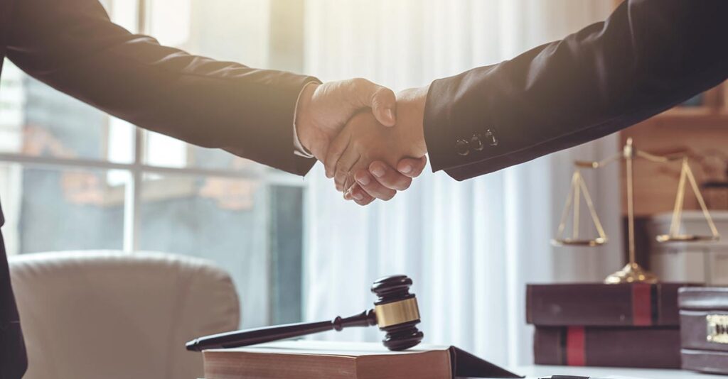 lawyers shaking hands